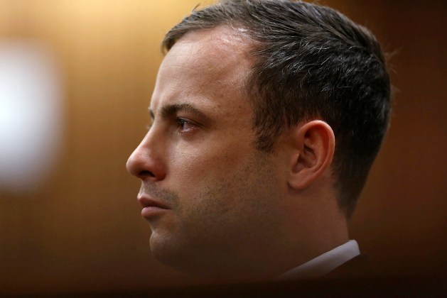 Olympic and Paralympic track star Pistorius listens to Judge Masipa deliver her verdict at the North Gauteng High Court in Pretoria