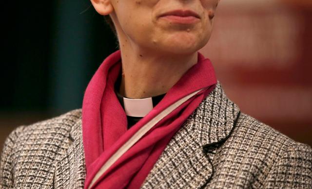 Libby Lane, a suffragan (Assistant) bishop in the Diocese of Chester, listens as her forthcoming appointment as the new Bishop of Stockport is announced in the Town Hall in Stockport