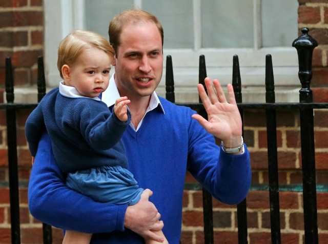 Britain's Prince William returns with his son George to the Lindo Wing of St Mary's Hospital, after the birth of his daughter in London