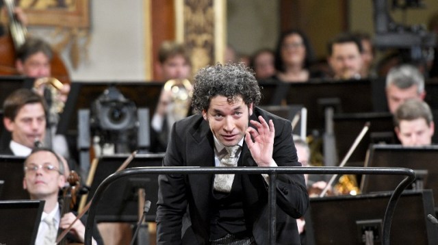 Venezulean conductor Gustavo Dudamel conducts the preview of the traditional New Year's Concert 2017 with the Vienna Philharmonic Orchestra at the Vienna Musikverein in Vienna, Austria, on December 30, 2016. The traditional New Year's Concert 2017 will take place on January 1, 2017. / AFP PHOTO / APA / HERBERT NEUBAUER / Austria OUT