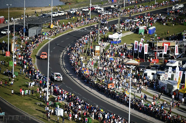 Aerial view of the 2017 Dakar Rally departure ceremony in Asuncion, Paraguay on January 1, 2017 ahead of the 2017 Dakar Rally which this year will thunder through Paraguay, Argentina and Bolivia from January 2 to 14. / AFP PHOTO / POOL / FRANCK FIFE