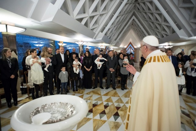 Pope Francis speaks as he arrives to baptise 13 babies coming from the earthquake zone of Amatrice at the Vatican January 14, 2017. Osservatore Romano/Handout via REUTERS ATTENTION EDITORS - THIS IMAGE WAS PROVIDED BY A THIRD PARTY. EDITORIAL USE ONLY. NO RESALES. NO ARCHIVE.
