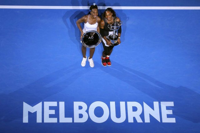 Tennis - Australian Open - Melbourne Park, Melbourne, Australia - 28/1/17 Serena Williams of the U.S. holds her trophy after winning her Women's singles final match against Venus Williams of the U.S. .REUTERS/Jason Reed   TPX IMAGES OF THE DAY