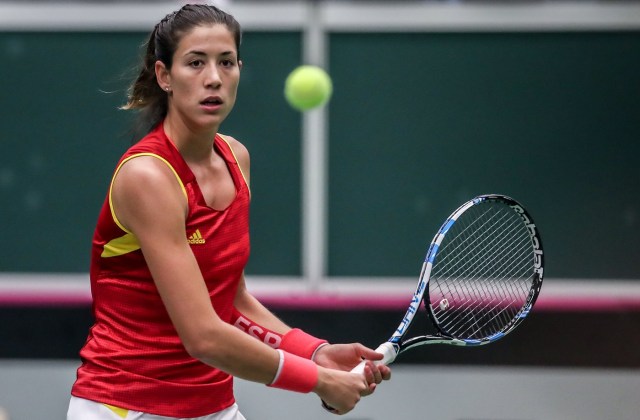 Ostrava (Czech Republic), 12/02/2017.- Spain's Garbine Muguruza in action against Karolina Pliskova of Czech Republic during their singles match of the Tennis Fed Cup World Group first round tie between the Czech Republic and Spain in Ostrava, Czech Republic, 12 February 2017. (España, República Checa, Tenis) EFE/EPA/MARTIN DIVISEK