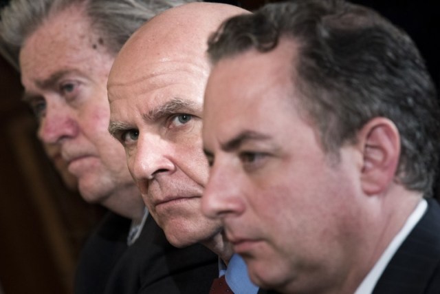 (From L-R): Strategist Steve Bannon, National Security advisor H.R. McMaster and White House Chief of Staff Reince Priebus listen during a joint press conference with NATO Secretary General Jens Stoltenberg and US President Donald Trump in the East Room of the White House April 12, 2017 in Washington, DC. NATO is the "bulwark of international peace and security" but its European members "must pay what they owe," US President Donald Trump said on Wednesday alongside the political head of the military alliance.  / AFP PHOTO / Brendan Smialowski