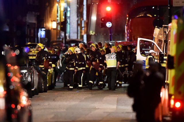 Emergency services attend to an incident near London Bridge in London, Britain, June 4, 2017. REUTERS/Hannah McKay