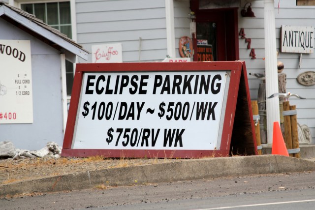 FILE PHOTO - A parking sign for people visiting for the Solar Eclipse is shown in Depoe Bay, Oregon, U.S. on August 9, 2017.    REUTERS/Jane Ross/File Photo