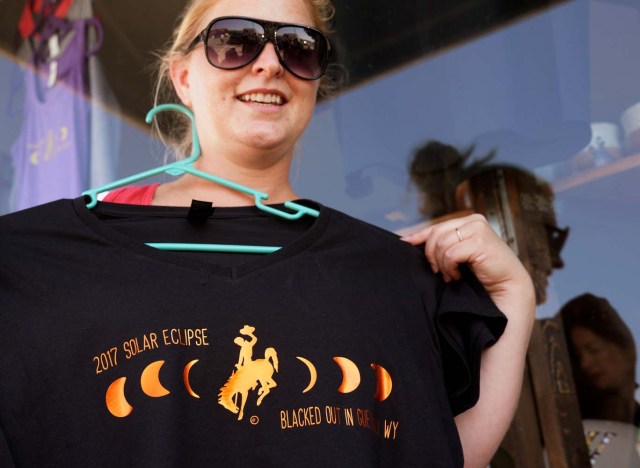 Melissa Howe displays one of her eclipse t-shirts designs in Guernsey, Wyoming, U.S., August 19, 2017. REUTERS/Rick Wilking NO RESALES. NO ARCHIVES.