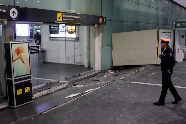 A view of damages on the floor in an entrance of the Benito Juarez international airport after an earthquake hit Mexico City, Mexico, September 8, 2017. REUTERS/Edgard Garrido