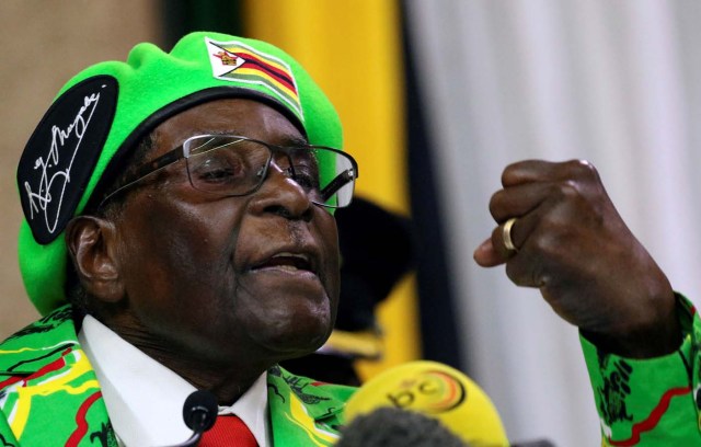 FILE PHOTO: FILE PHOTO: Zimbabwean President Robert Mugabe addresses a meeting of his ruling ZANU PF party's youth league in Harare, Zimbabwe, October 7, 2017. REUTERS/Philimon Bulawayo/File Photo/File Photo