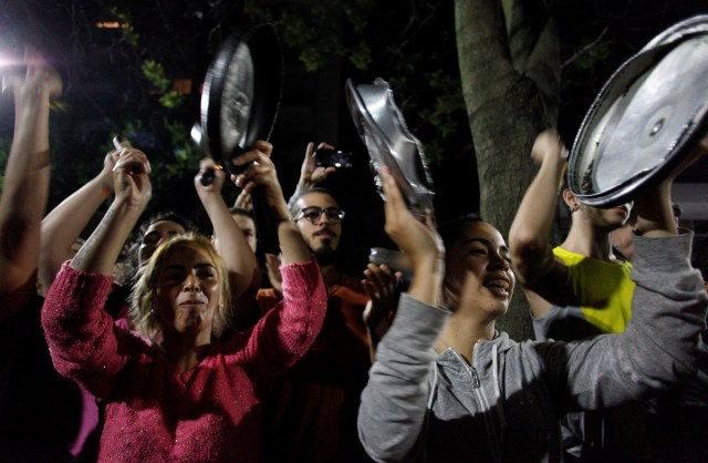 Demonstrators shout slogans at the Olivos Presidential Residence as lawmakers debate a pension reform measure at the Argentine Congress, in Buenos Aires, Argentina December 19, 2017. REUTERS/Martin Acosta