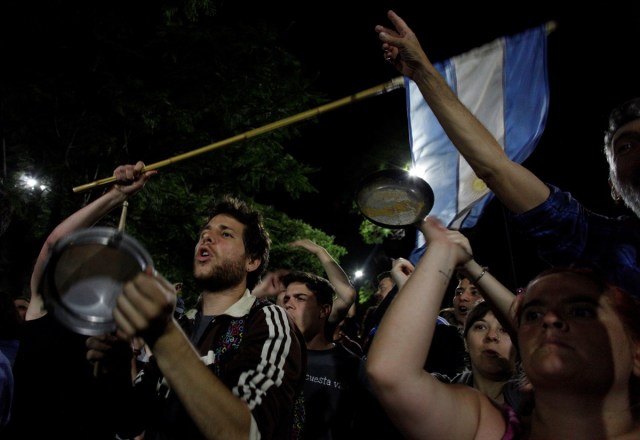 Demonstrators shout slogans at the Olivos Presidential Residence as lawmakers debate a pension reform measure at the Argentine Congress, in Buenos Aires, Argentina, December 19, 2017. REUTERS/Martin Acosta