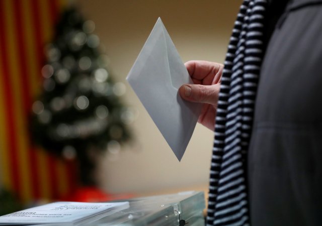 A man casts his ballot in Catalonia's regional elections at a polling station in Vic, Spain December 21, 2017. REUTERS/Juan Medina