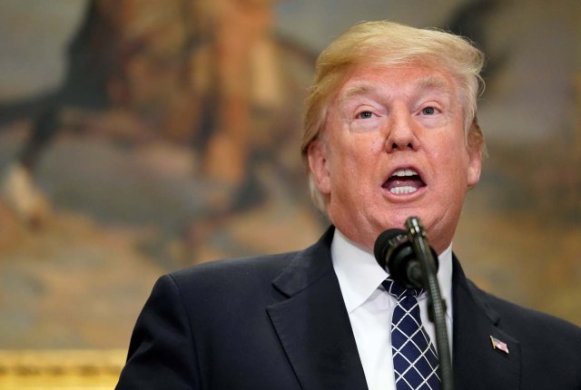 U.S. President Donald Trump speaks before signing a proclamation to honor Martin Luther King Jr. day in the Roosevelt Room of the White House in Washington, U.S., January 12, 2018. REUTERS/Joshua Roberts