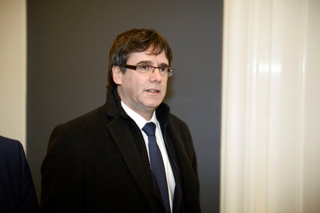 The Catalan separatist leader Carles Puigdemont arrives for a meeting with Danish members of Parliament, after being invited by the Faroese parliamentary member Magni Arge, at Christiansborg in Copenhagen, Denmark January 23, 2018. Mads Claus Rasmussen/Scanpix Denmark via REUTERS ATTENTION EDITORS - THIS IMAGE WAS PROVIDED BY A THIRD PARTY. DENMARK OUT. NO COMMERCIAL OR EDITORIAL SALES IN DENARK.