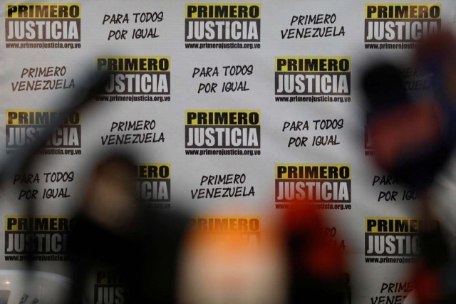The logo of opposition party Justice First (Primero Justicia) is seen during a news conference in Caracas, Venezuela January 26, 2018. REUTERS/Marco Bello