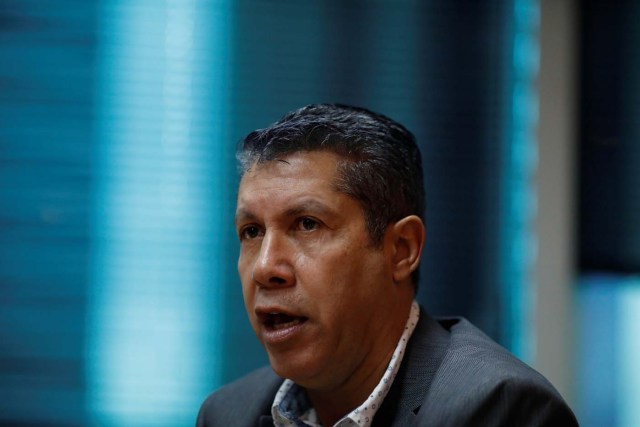 Venezuelan opposition presidential pre-candidate Henri Falcon speaks during a meeting with representatives of international media in Caracas, Venezuela February 20, 2018. REUTERS/Marco Bello