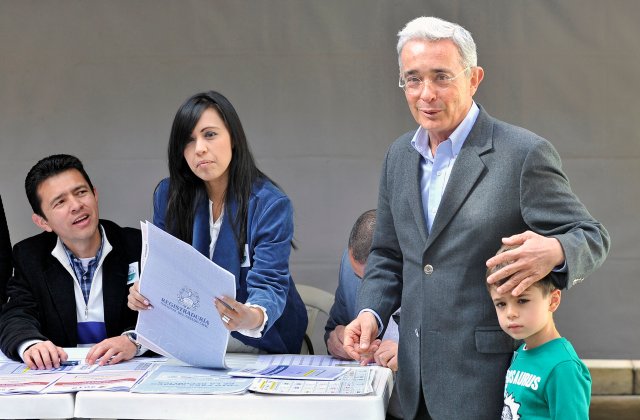 Colombian former President Alvaro Uribe casts his vote during the legislative elections in Bogota, Colombia March 11, 2018. REUTERS/Carlos Julio Martinez   NO RESALES. NO ARCHIVES.