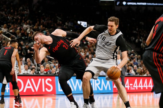 Apr 7, 2018; San Antonio, TX, USA; San Antonio Spurs center Pau Gasol (16) drives to the basket as Portland Trail Blazers center Jusuf Nurkic (27) defends during the second half at AT&T Center. Mandatory Credit: Soobum Im-USA TODAY Sports