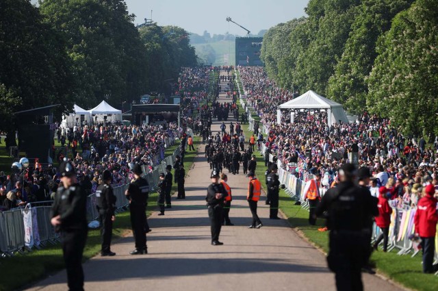 Royal fans gather outside Windsor Castle ahead of wedding of Britain's Prince Harry to Meghan Markle in Windsor, Britain, May 19, 2018. REUTERS/Hannah McKay/Pool