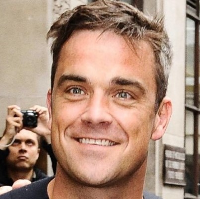 Robbie Williams se tatuará fechas importantes por ser “numéricamente disléxico”