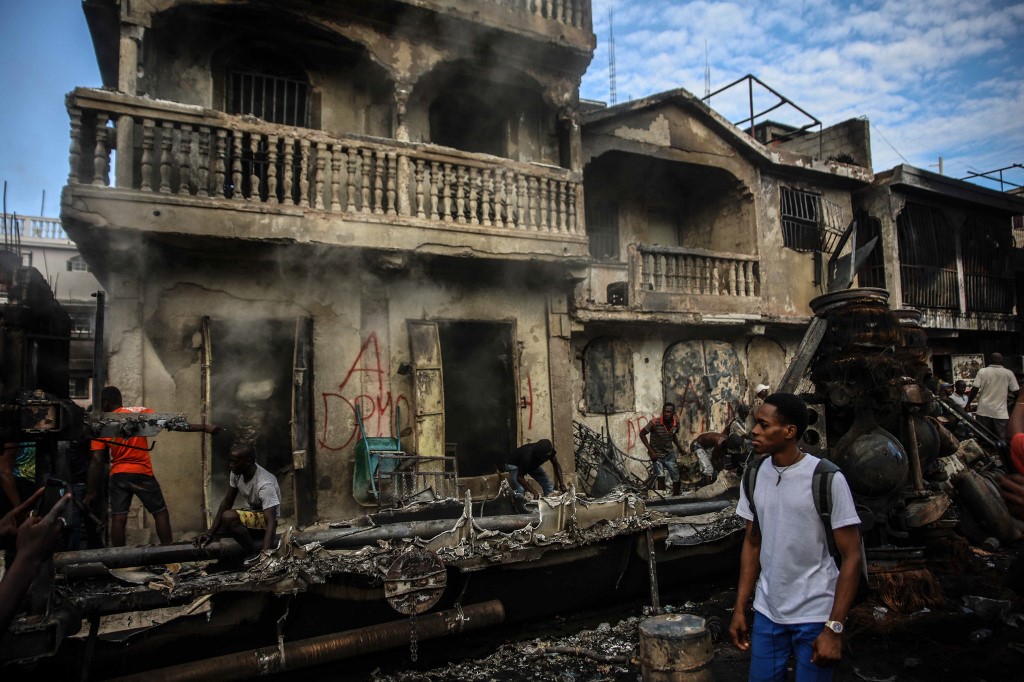Miseria y pandillas tras la explosión trágica del camión cisterna en Haití (Fotos)